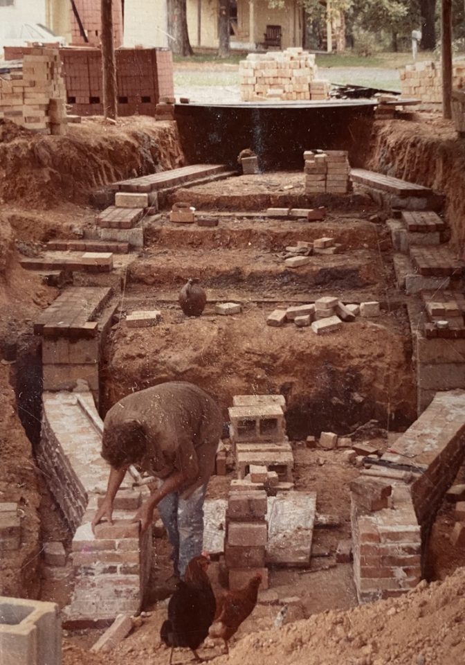 Mark Hewitt laying the first brick